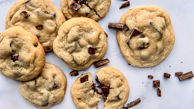 soft-baked chocolate chip cookies on marble serving board