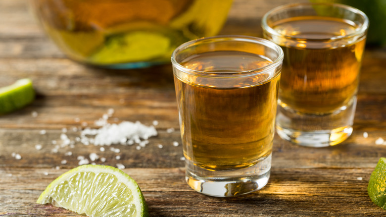 two tequila shots with lime and salt