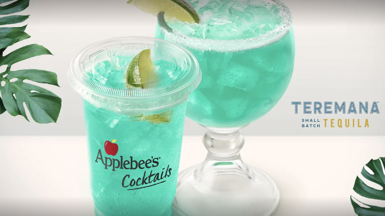 Applebee's special edition Blue Aloha Margarita in plastic cup and glass