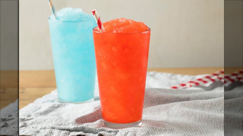 Red and blue slushies with straws