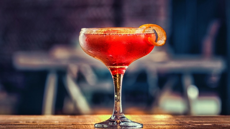 red cocktail in glass