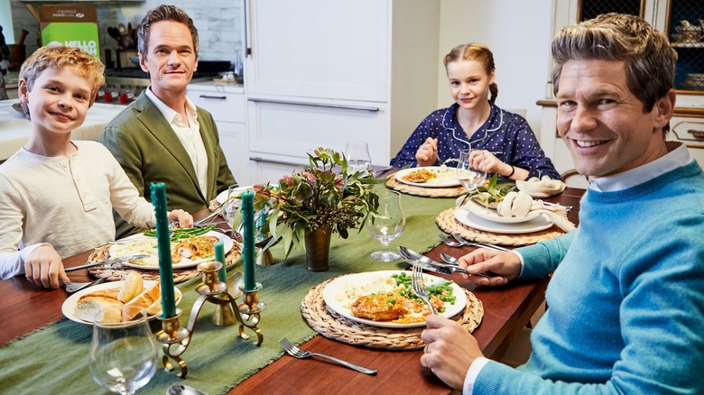 Neil Patrick Harris, David Burtka, and kids around dinner table