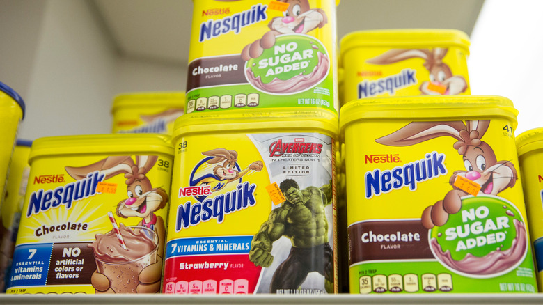 Shelf of stacked Nesquik containers