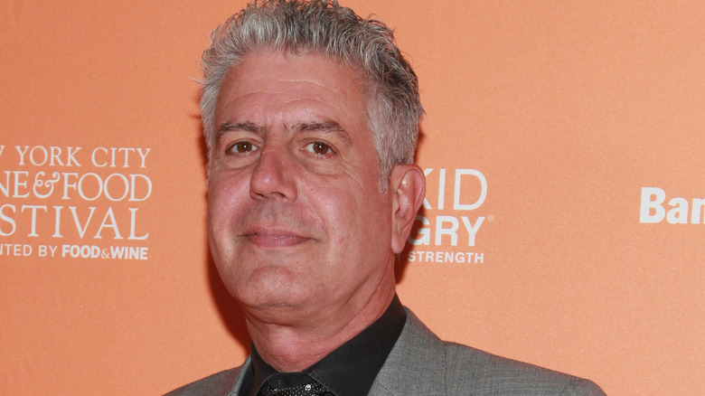 Anthony Bourdain in a suit 