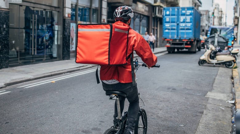 Delivery driver on bike
