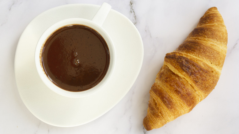 Hot chocolate and croissant