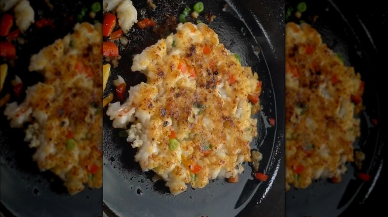 smashed shrimp patty on a skillet