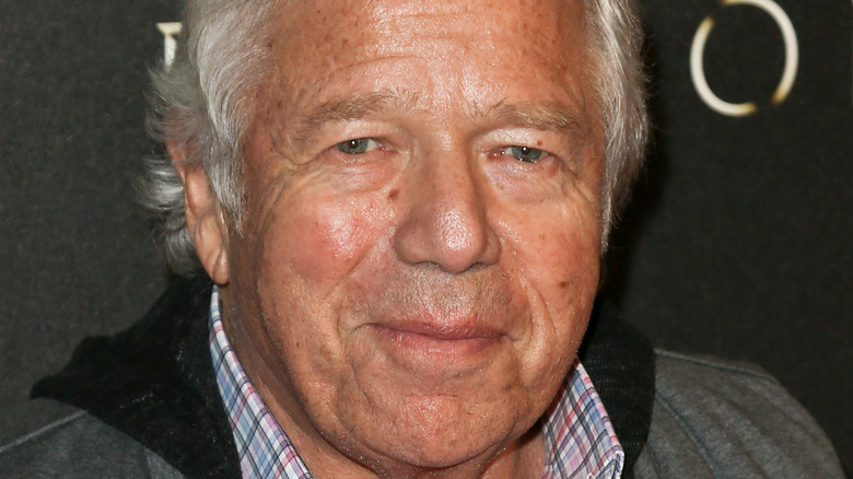 Robert Kraft in plaid shirt and jacket