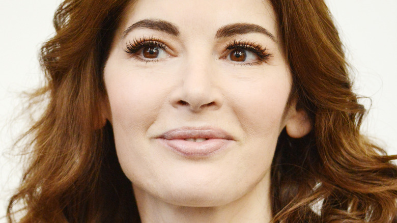 Nigella Lawson with hair down and slight smirk