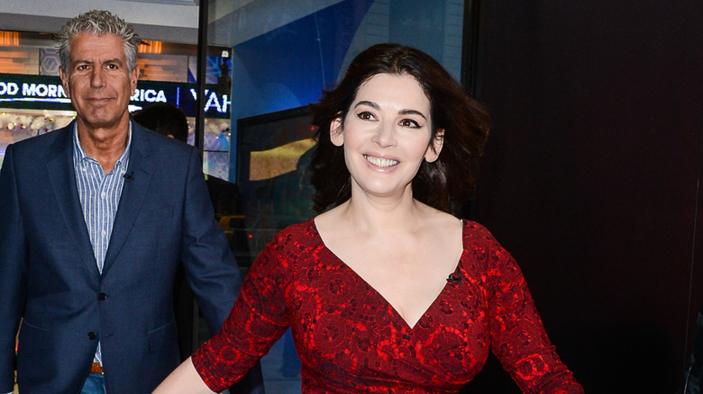 Anthony Bourdain and Nigella Lawson exiting a TV studio