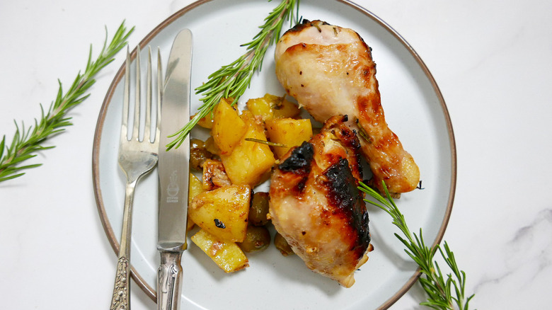 chicken and potatoes on plate