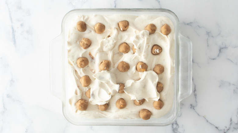 peanut butter cookie dough ice cream in glass dish
