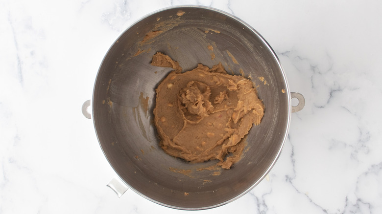 peanut butter sugar batter in mixer