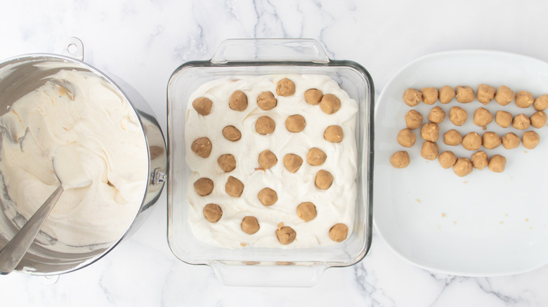 ice cream and cookie dough balls in glass dish