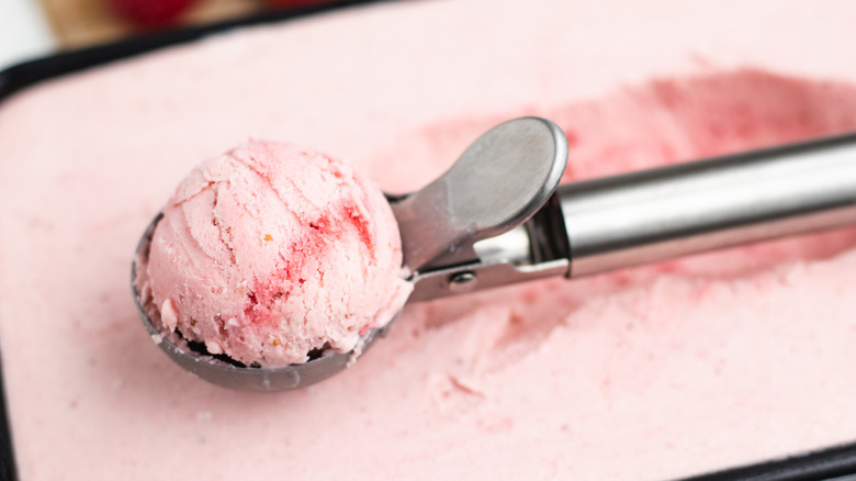 strawberry ice cream in scooper