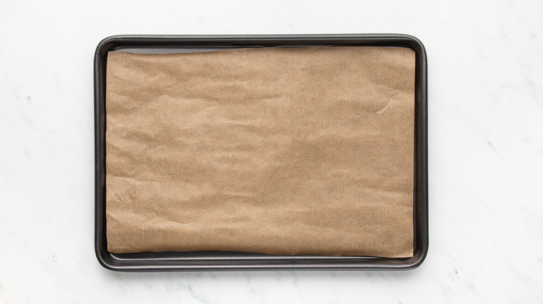 Baking sheet lined with parchment paper