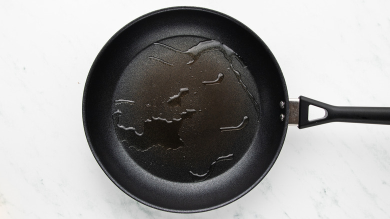 Oil heating in frying pan