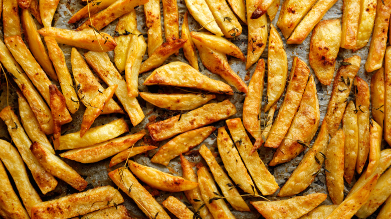 Baked French fries on parchment