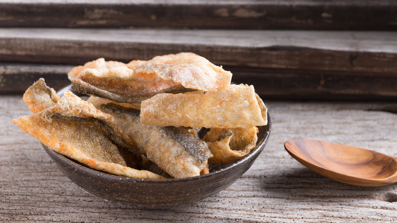 A bowl of fried salmon skins