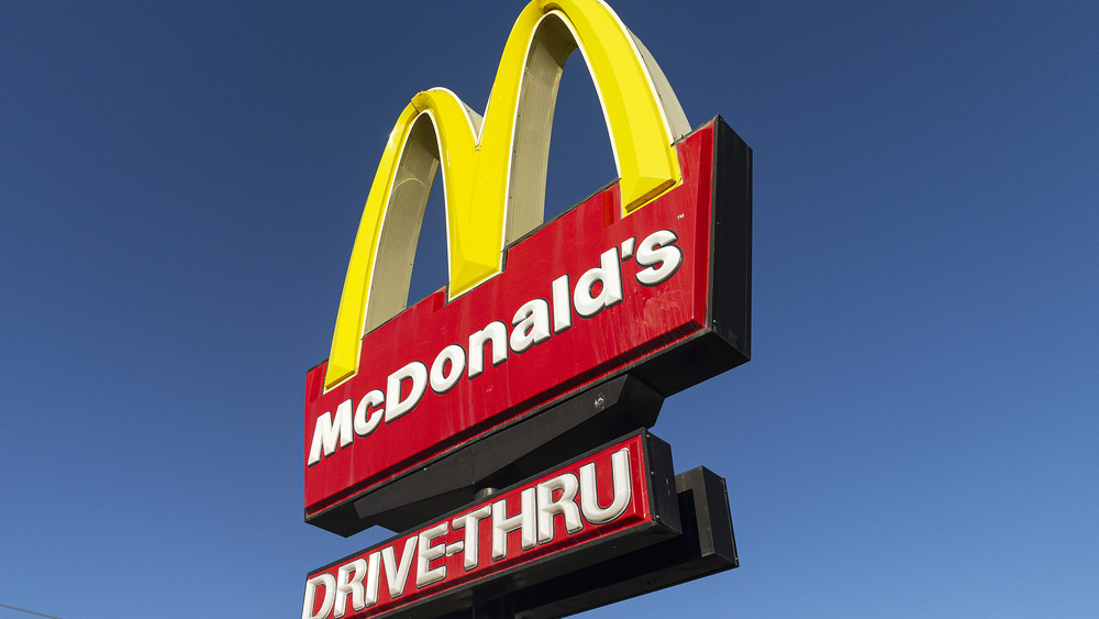 McDonald's sign with blue sky behind it