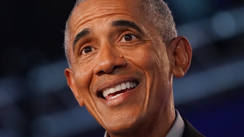 Former President Barack Obama smiling