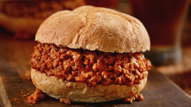 sloppy Joes sandwich on a wooden board