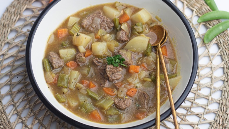 A serving of old fashioned vegetable beef soup in a bowl