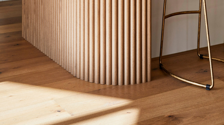 Curved, fluted island in kitchen