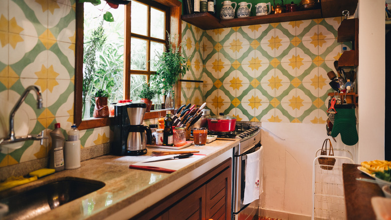 Kitchen with bold geometric tile backsplash