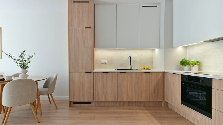 Kitchen with oak Scandinavian-style cabinets
