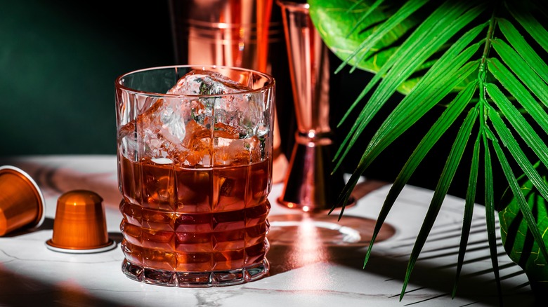 brown liquor in crystal glass