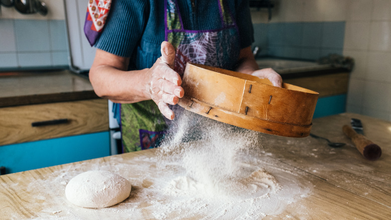lady sifting flour