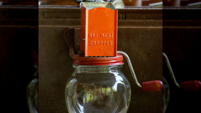 Orange old fashioned nut grinder