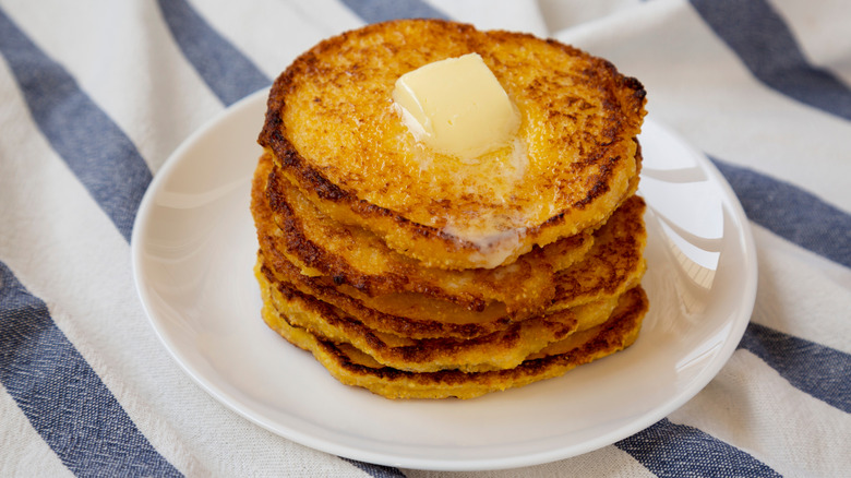 Stack of Johnny cakes with butter