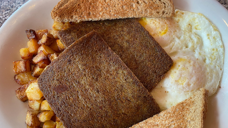 Scrapple breakfast with eggs and toast
