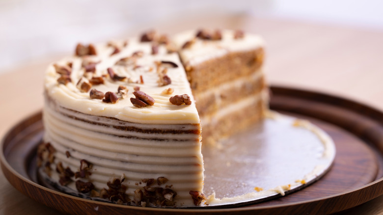 pecan-covered Lane cake on plate