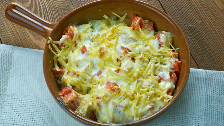Pot of king ranch chicken casserole on wooden table