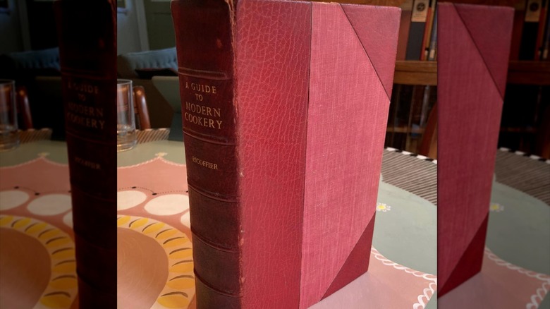 Red and pink cover of Modern Cookery book