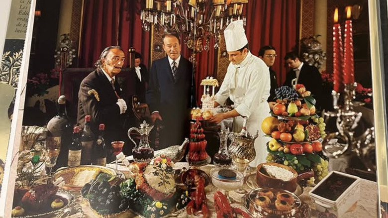 Colorful photo of Salvador Dalí with food
