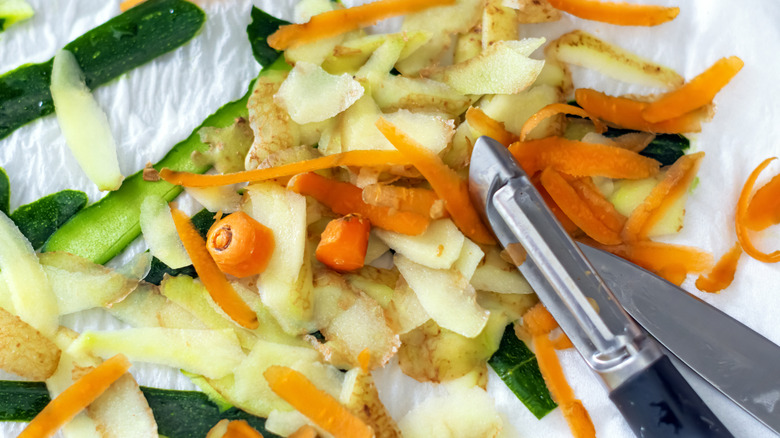 Vegetable peels of carrots, potatoes and zucchini freshly peeled with a peeler.