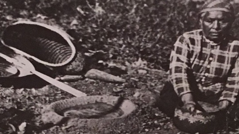 Native American woman preparing acorn mush