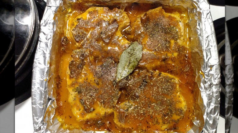 Smothered pork chops in foil