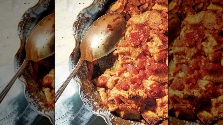 Tomato pudding with silver serving spoon