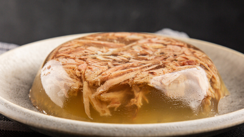 A close-up of jellied meat on plate