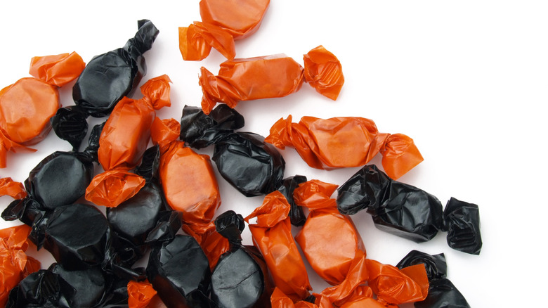 peanut butter kisses in orange and black wrappers