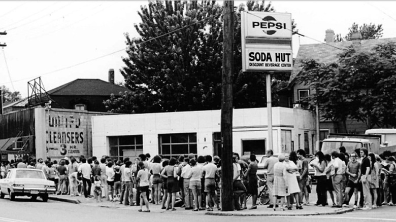 line of people outside old ice cream shop