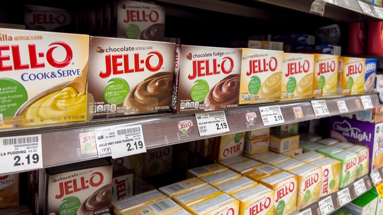 instant pudding mix boxes on supermarket shelf