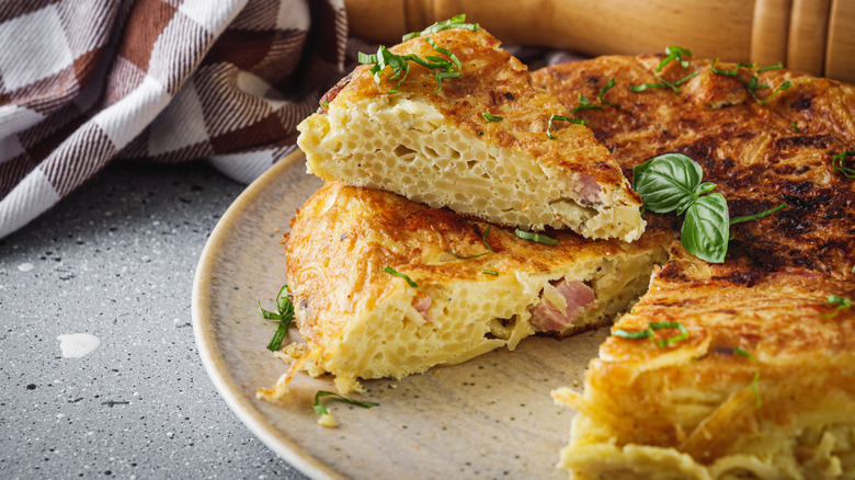 Sliced frittata di spaghetti on plate