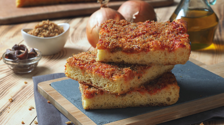 Slices of sfincione stacked on top of one another
