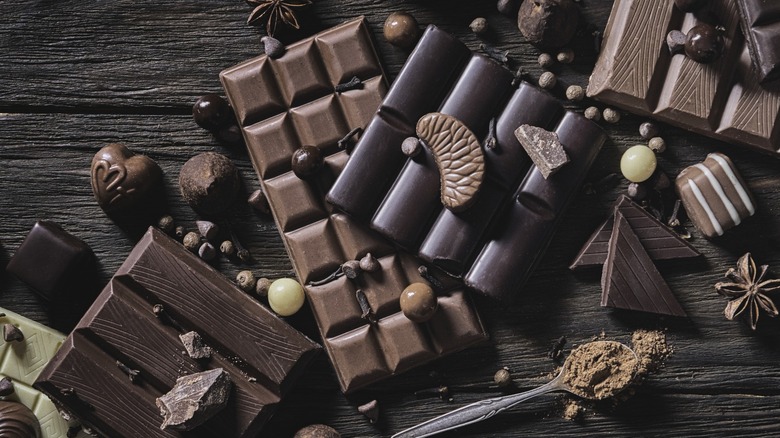 A pile of various candy bars